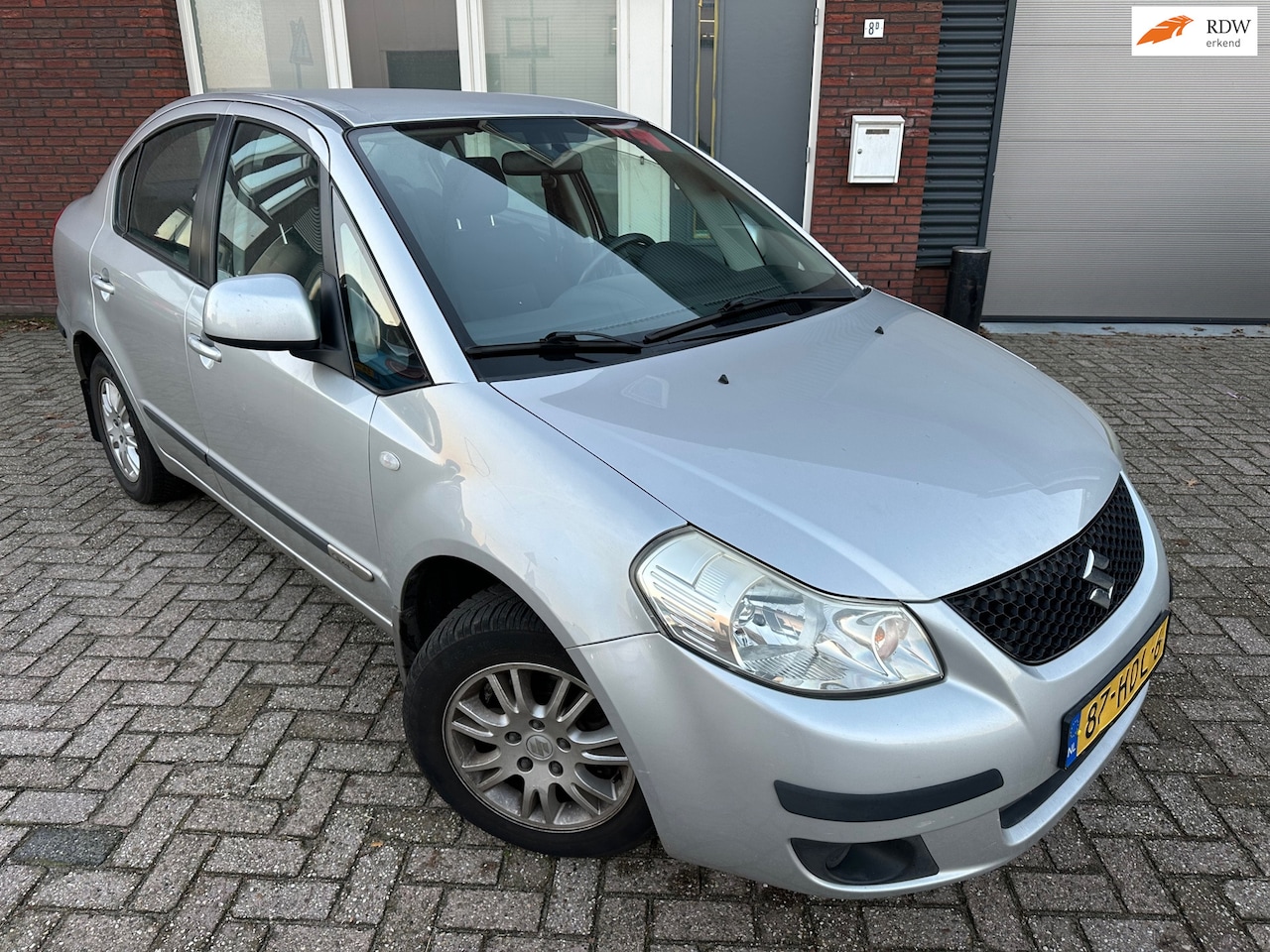 Suzuki SX4 - 1.6 Comfort / Airco / LM / NAP - AutoWereld.nl