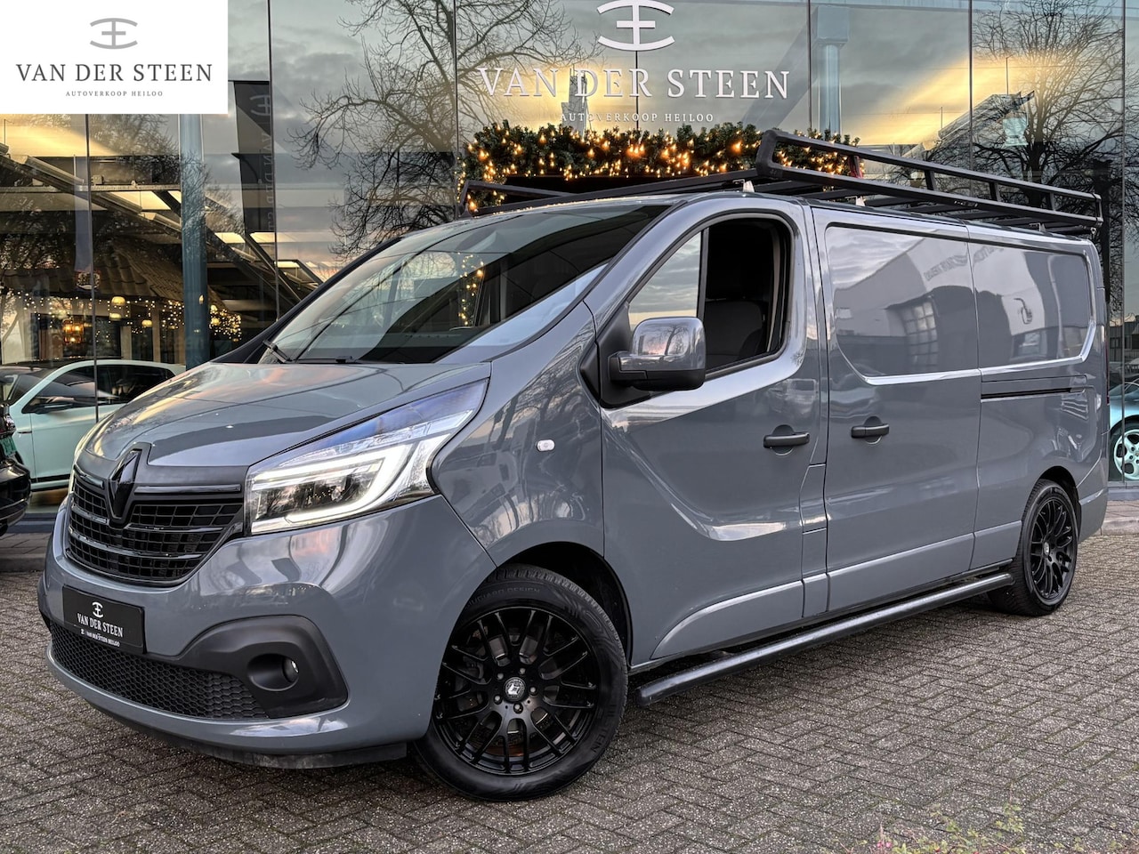 Renault Trafic - 2.0 dCi 145 T29 L2H1 Luxe 2x Schuifdeur | Black edition | 1e eigenaar | Stoelverwarming - AutoWereld.nl