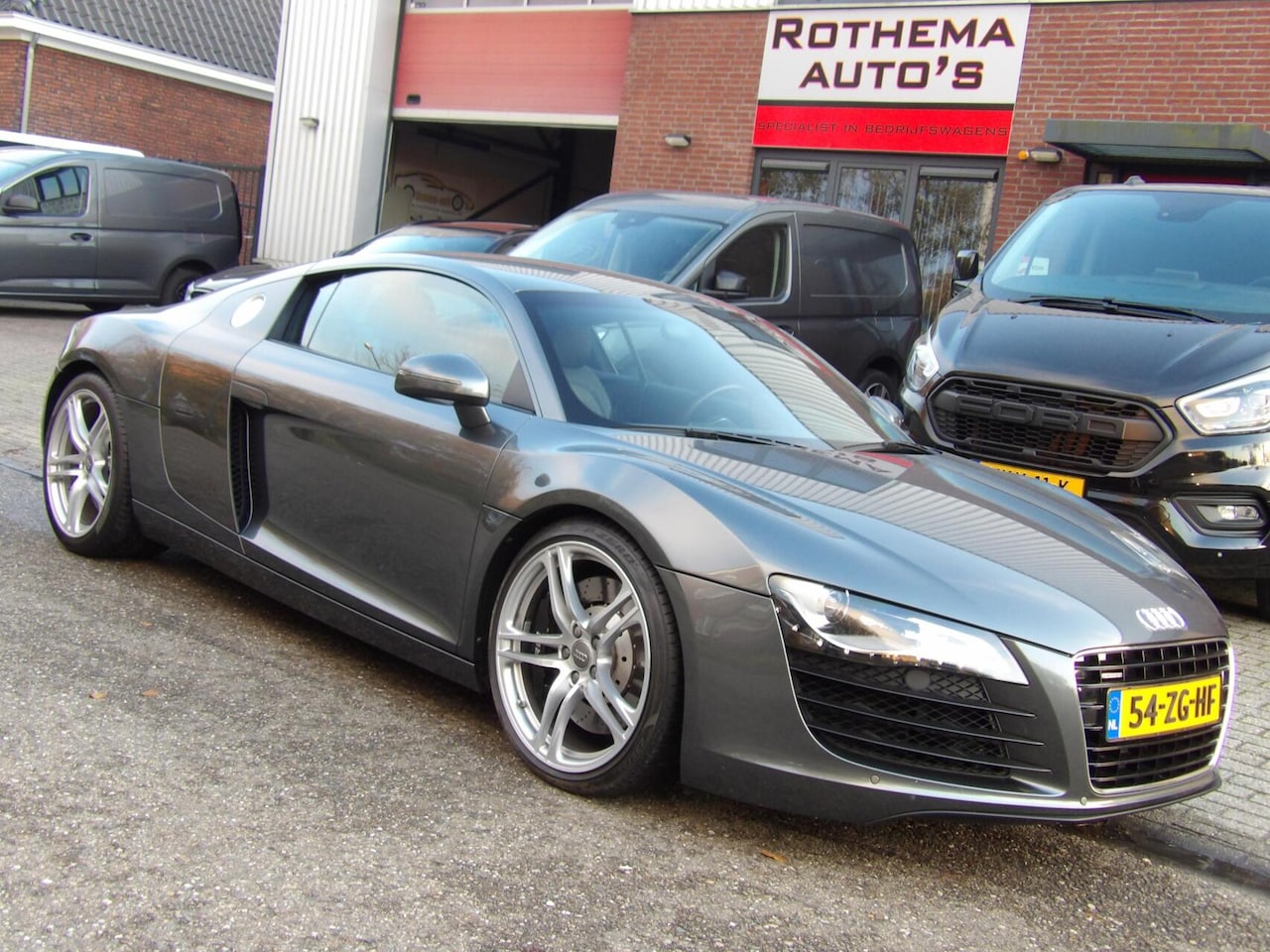 Audi R8 - 4.2 V8 FSI 2008 DAYTONA GRIJS CARBON 2e EIG. NL AUTO 26055km NIEUWSTAAT - AutoWereld.nl