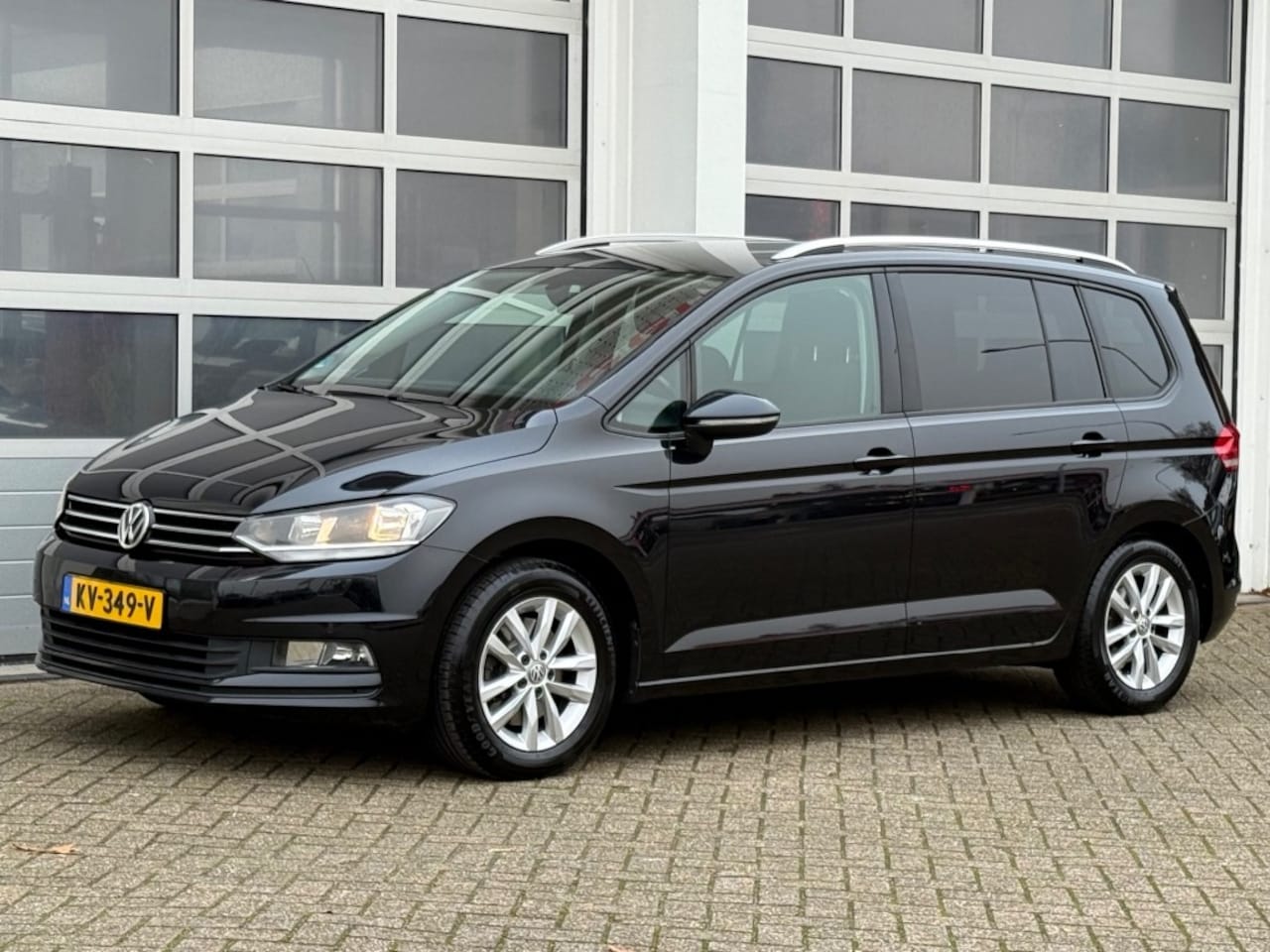 Volkswagen Touran - 1.4 TSI 150PK AUT 7-PERS Navi Camera Trekhaak Rijklaar! - AutoWereld.nl