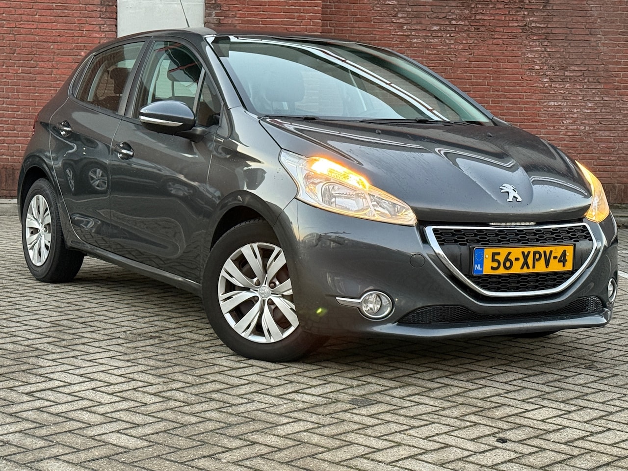 Peugeot 208 - 1.4 VTi Envy|5DRS|NAVI|AIRCO|CRUISE|ELEKT.RAMEN - AutoWereld.nl