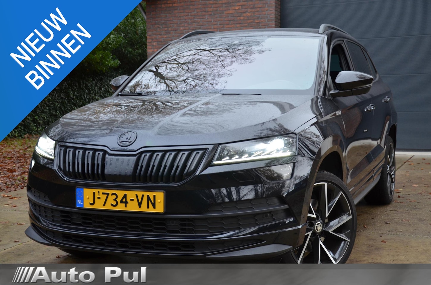 Skoda Karoq - 1.5 TSI ACT Sportline Business Navi/Audio installatie premium/Led/Pdc/Ecc/Stoelverwarming/ - AutoWereld.nl