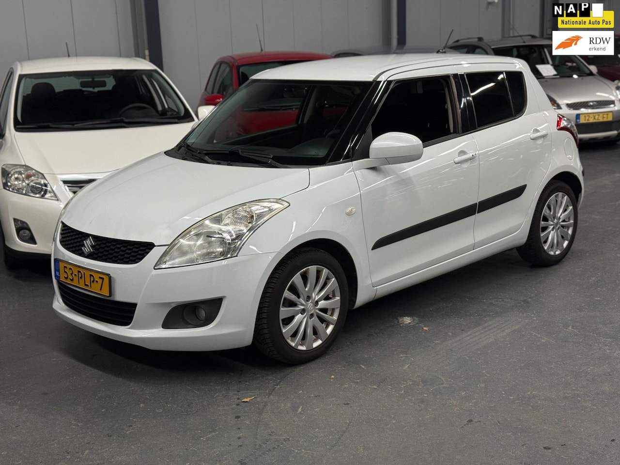 Suzuki Swift - 1.2 Exclusive EASSS Nieuwe Koppeling APK NAP - AutoWereld.nl