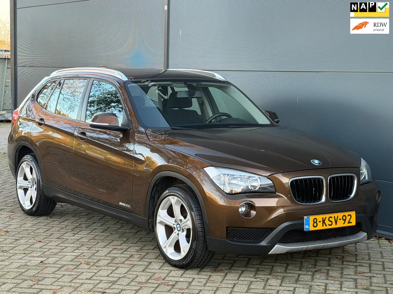 BMW X1 - SDrive20i Executive NAVI CLIMA CRUISE TREKHAAK - AutoWereld.nl