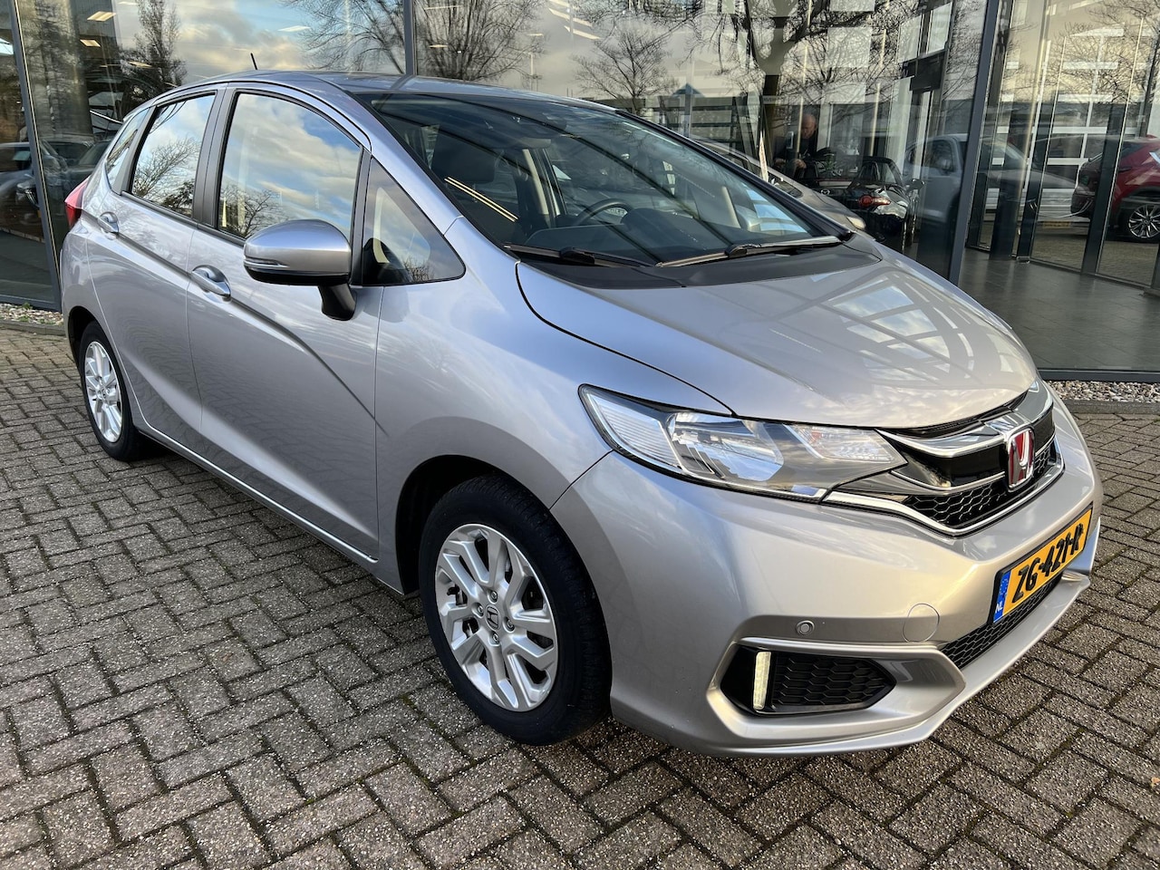 Honda Jazz - 1.3 i-VTEC Comfort TREKHAAK | NAVIGATIE | PARKEER SENSOREN V+A | AIRCO | CRUISE CONTROLE | - AutoWereld.nl