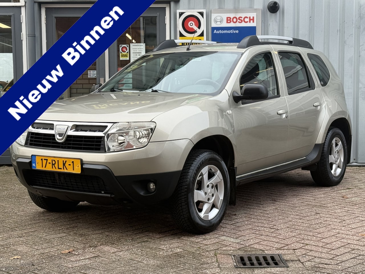 Dacia Duster - 1.6 Lauréate 2wd | TREKHAAK | AIRCO | LICHTMETAAL | - AutoWereld.nl