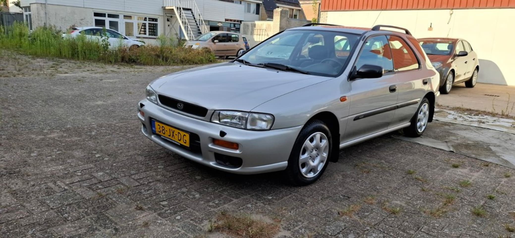 Subaru Impreza Plus - 2.0 GL AWD. AUTOMAAT - AutoWereld.nl