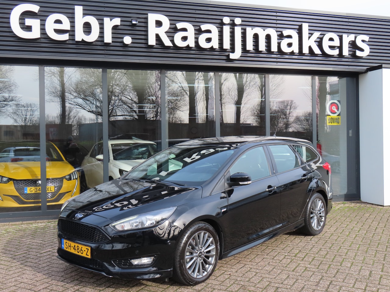 Ford Focus Wagon - 1.0 126pk ST-Line*Navigatie*Airco* - AutoWereld.nl