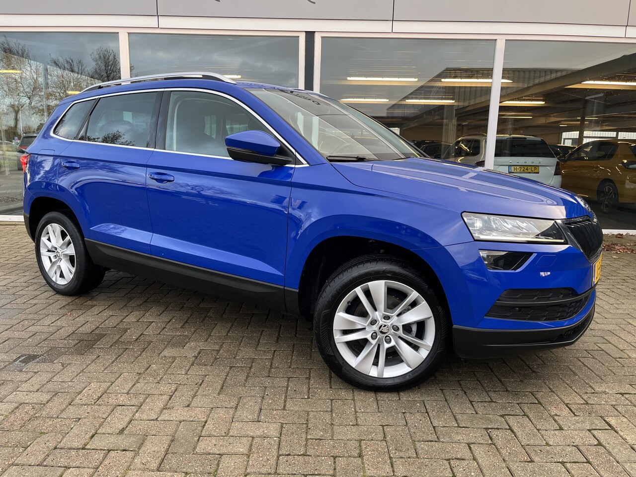 Skoda Karoq - 1.0 TSI Business Edition Plus / Pano / LMV / Virtual / Clima 50% deal 6.475,- ACTIE - AutoWereld.nl