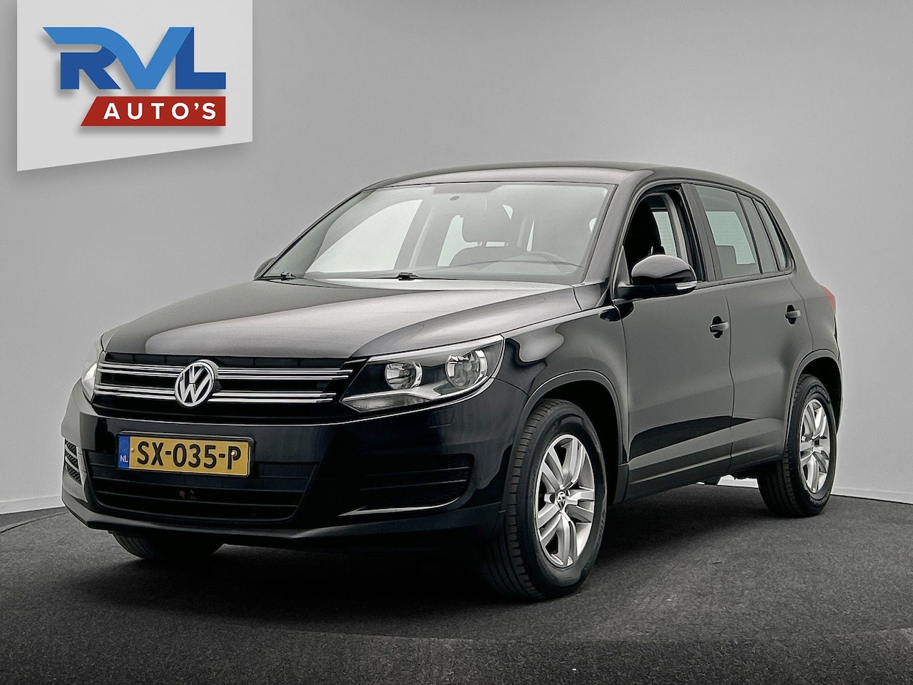 Volkswagen Tiguan - 1.4 TSI Comfort&Design Edition Stoelverwarming Navigatie Trekhaak - AutoWereld.nl