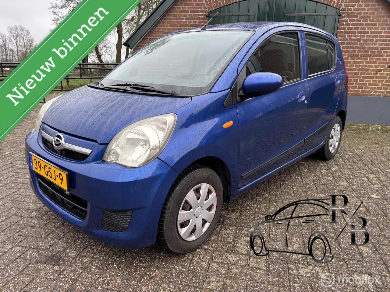 Daihatsu Cuore - 1.0 Premium AIRCO - AutoWereld.nl