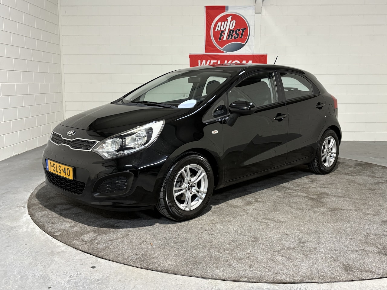 Kia Rio - 1.2 CVVT Comfort Pack 1.2 CVVT Comfort Pack, lage km stand, NL auto, Airco, Lichtmetaal, Trekhaak, Isofix, Boekj - AutoWereld.nl
