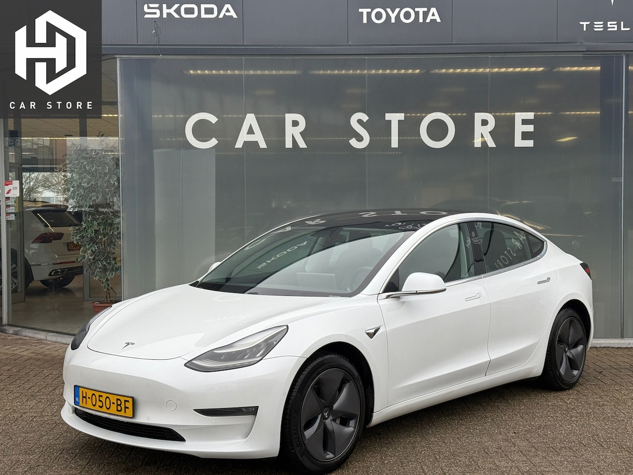 Tesla Model 3 - Long Range RWD Long Range AWD 75 kWh 88% SOH TREKHAAK DUAL MOTOR - AutoWereld.nl