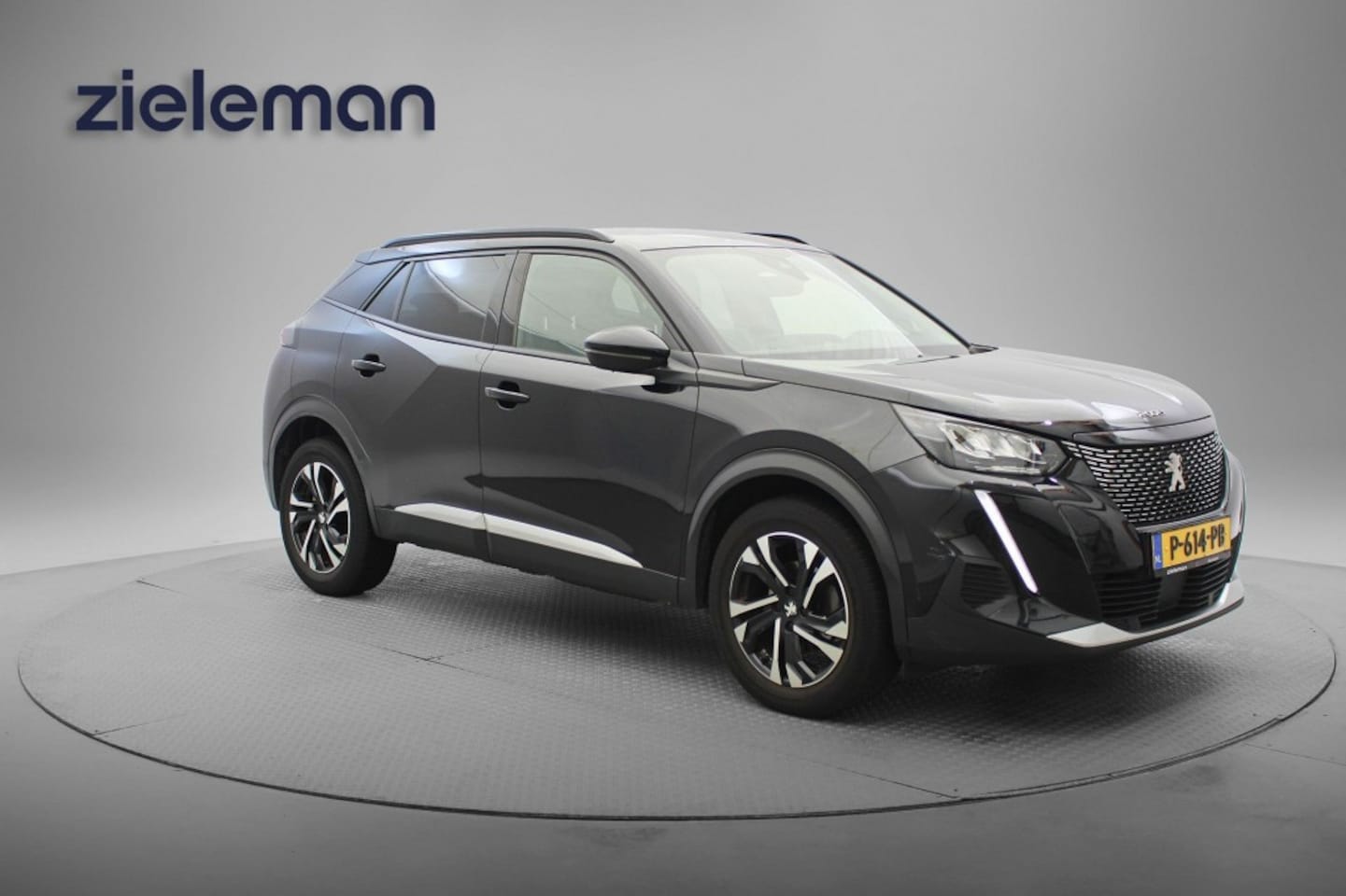 Peugeot 2008 - 1.2 PureTech Allure - Carplay, Camera, Half Leer - AutoWereld.nl