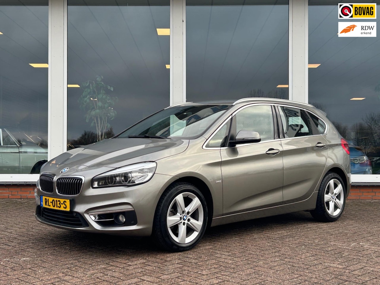 BMW 2-serie Active Tourer - 218i High Executive - Navi - Leder - Clima - Camera - AutoWereld.nl