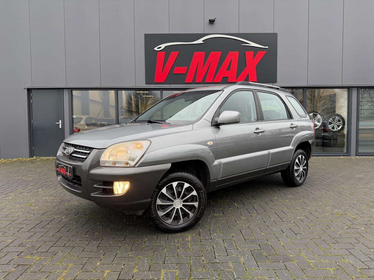 Kia Sportage - 2.0 CVVT Executive NAP ½ Leder Climate Trekhaak - AutoWereld.nl
