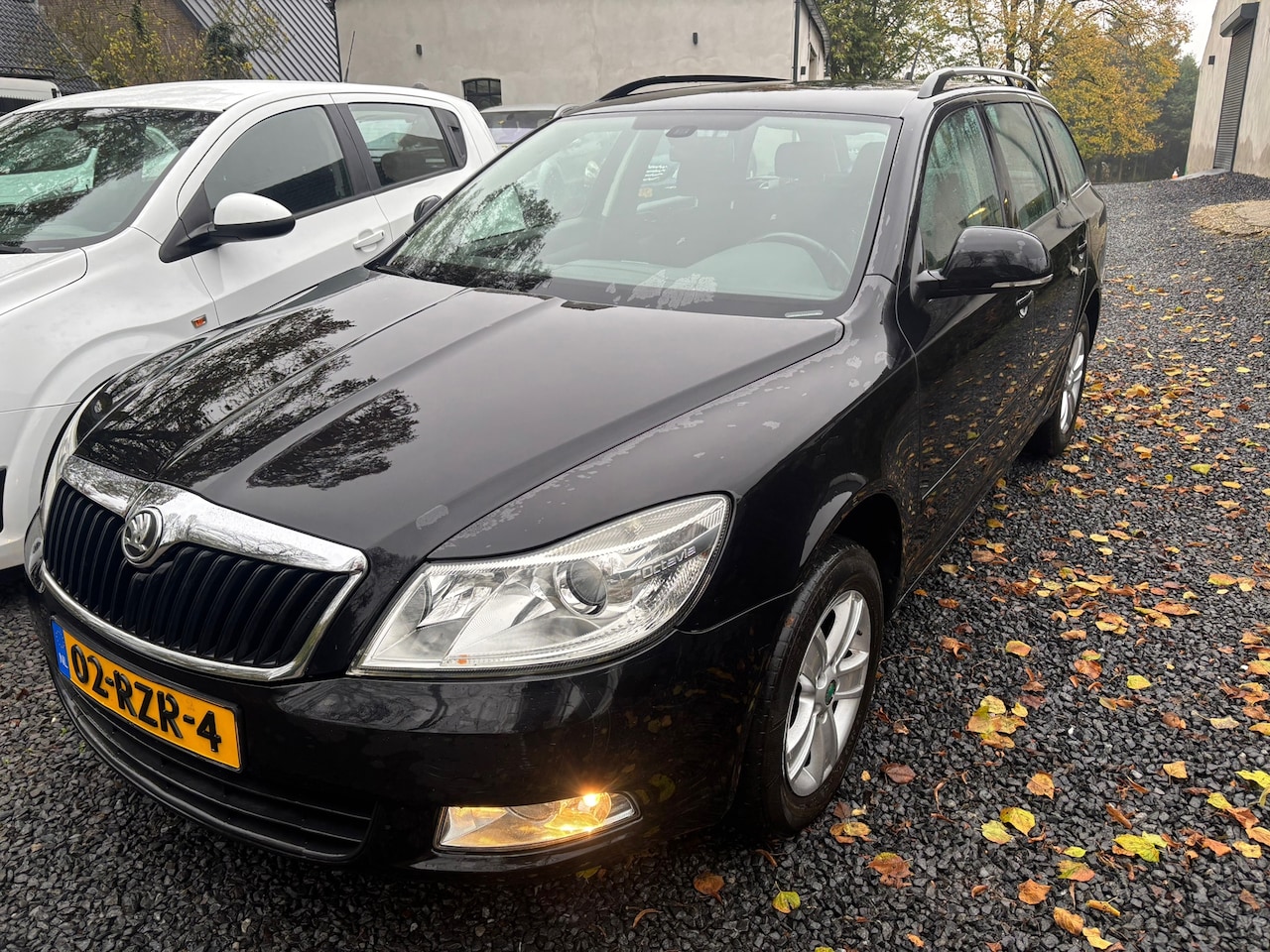 Skoda Octavia Combi - 1.2 TSI Ambition Business Line NAVIGATIE - AutoWereld.nl