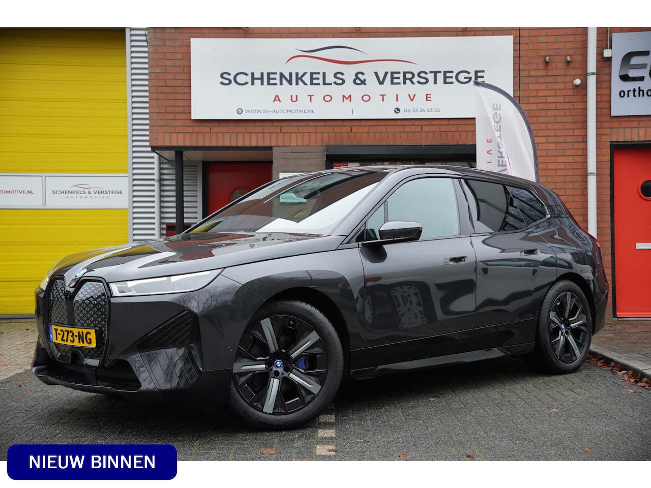 BMW iX - xDrive40 Excellence 77 kWh / Massage / Glasdak / Dealerond. - AutoWereld.nl