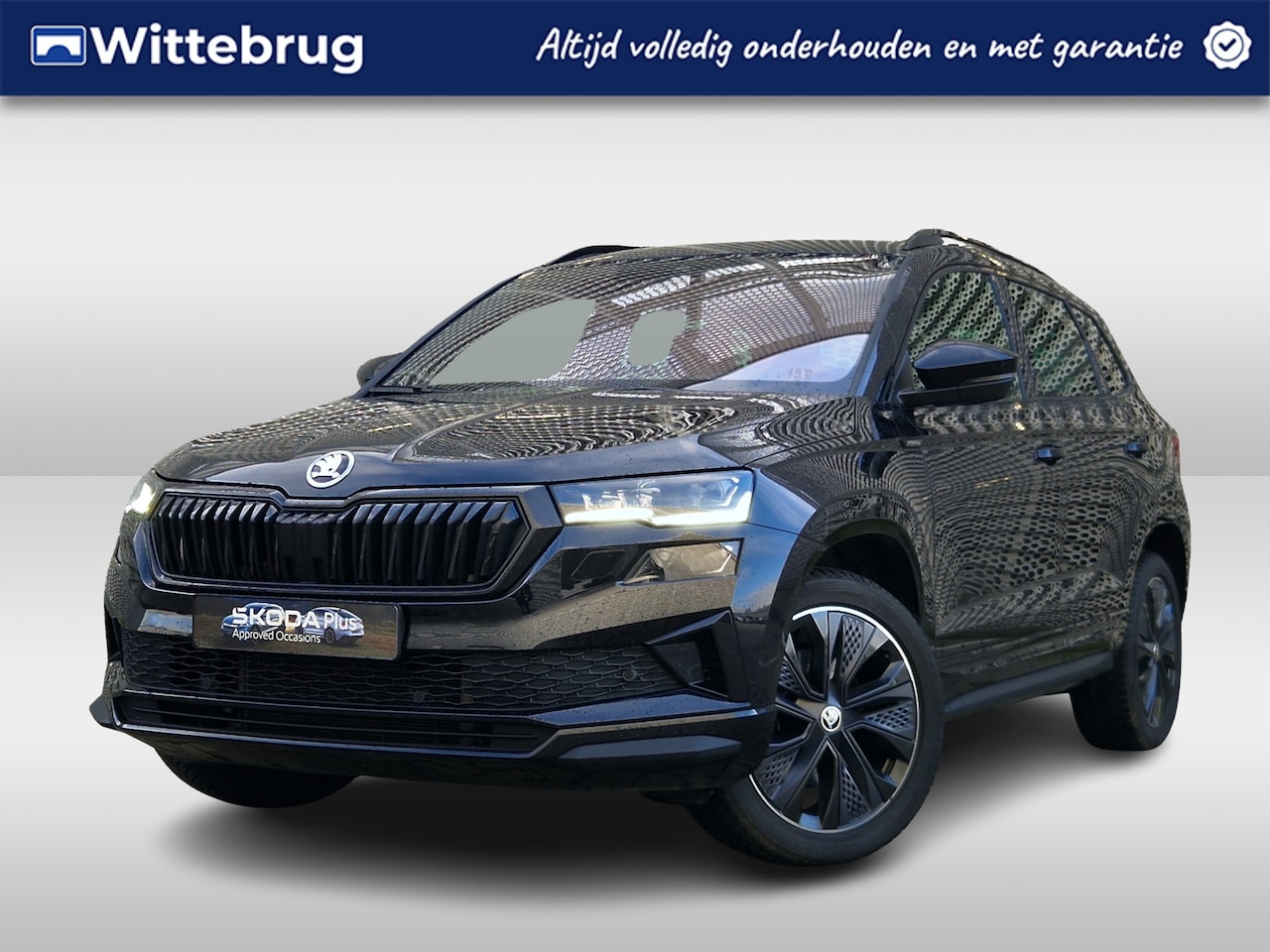 Skoda Karoq - 1.5 TSI 150pk DSG Sportline Business / Panoramadak /  Leder / Memory Stoelen / Navi / Came - AutoWereld.nl