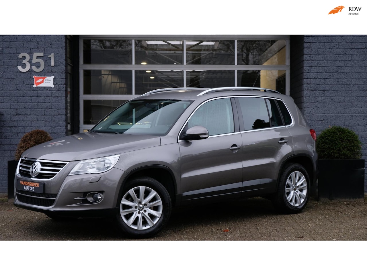 Volkswagen Tiguan - 2.0 TSI Comfort&Design 4Motion 200PK Cruise|Navi|Camera - AutoWereld.nl