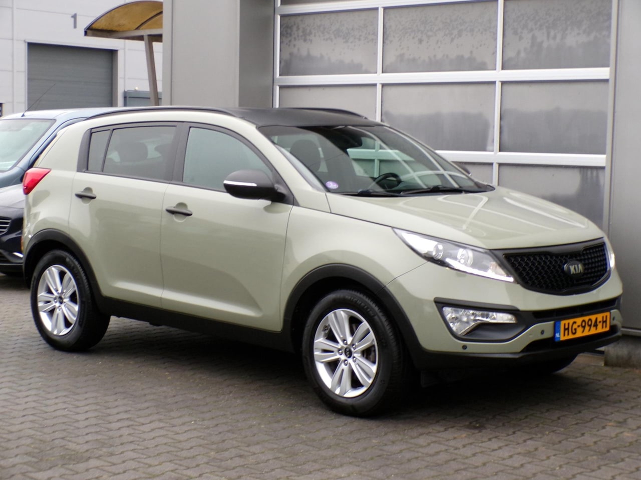 Kia Sportage - 1.6 GDI X-treme DynamicLine|Cam|PDC|Trekhaak|BT - AutoWereld.nl