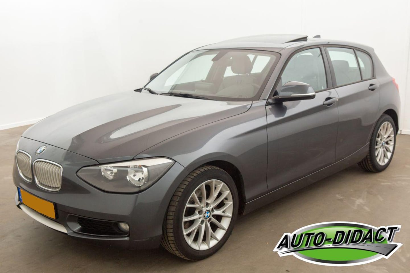 BMW 1-serie - 118i Clima Navi Elek Dak - AutoWereld.nl
