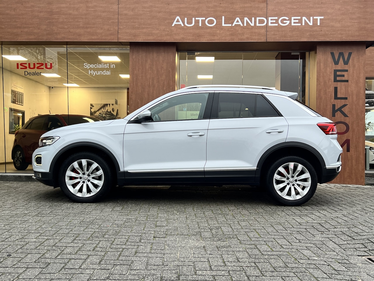 Volkswagen T-Roc - 1.5 TSI Sport | Apple/ android carplay | Climate control | Automaat | Cuise contol - AutoWereld.nl