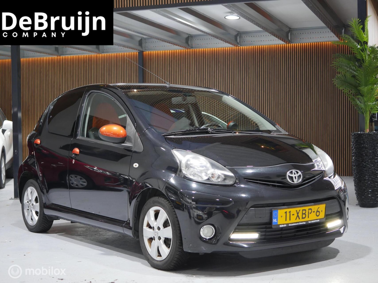 Toyota Aygo - 1.0 VVT-i Dynamic Orange 1.0 VVT-i Dynamic Orange - AutoWereld.nl