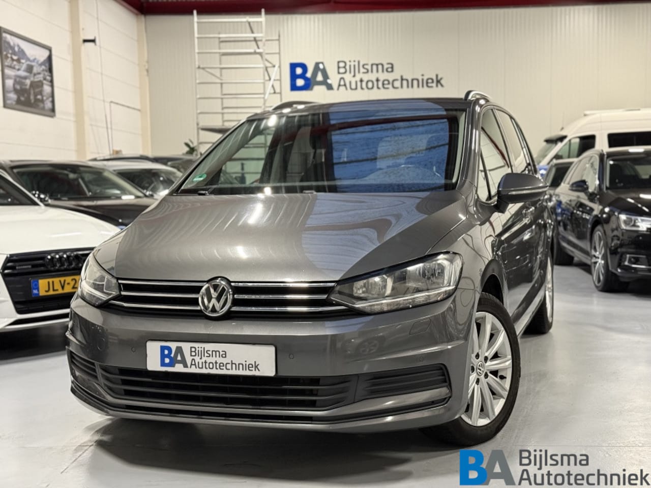 Volkswagen Touran - 1.2 TSI Comfortline | 7p. | PDC | 17" LMV | Netjes! - AutoWereld.nl