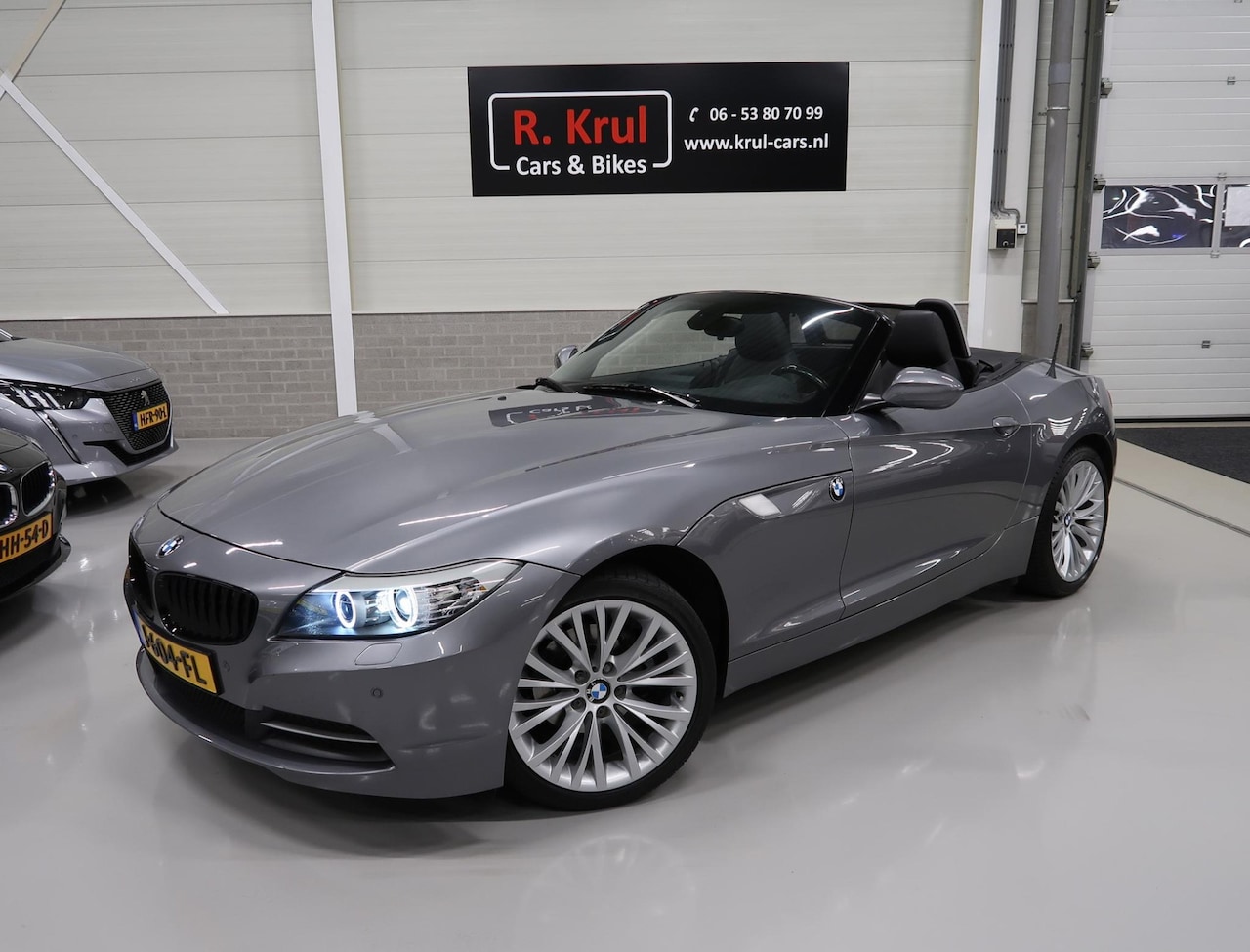 BMW Z4 Roadster - sDrive20i Leer Navigatie Airco Cruisecontrol Sportvelgen 18 inch Zeer nette staat Boekjes - AutoWereld.nl