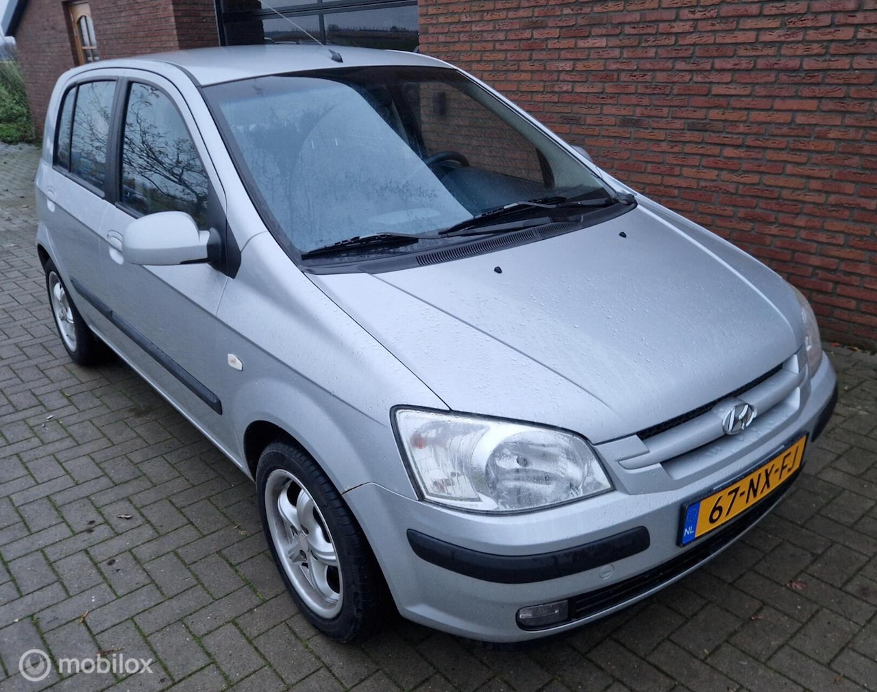 Hyundai Getz - 1.3i GLS Automaat Airco - AutoWereld.nl