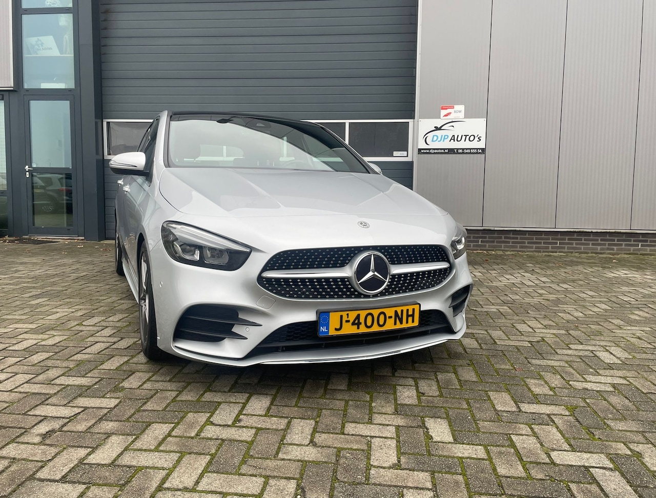 Mercedes-Benz B-klasse - 180 Business Solution AMG Panoramadak / Afneembare trekhaak / Navigatie / Airco / Cruise control / Virt.cockpit - AutoWereld.nl