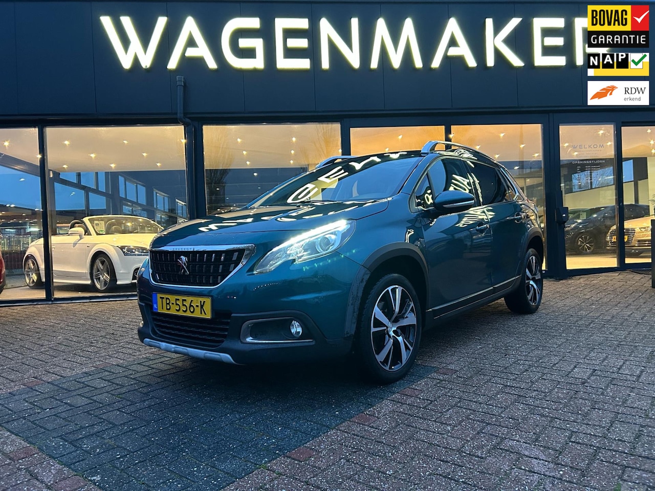 Peugeot 2008 - 1.2 PureTech Allure PANO|NAVI|Cruise|CAM|Carplay - AutoWereld.nl