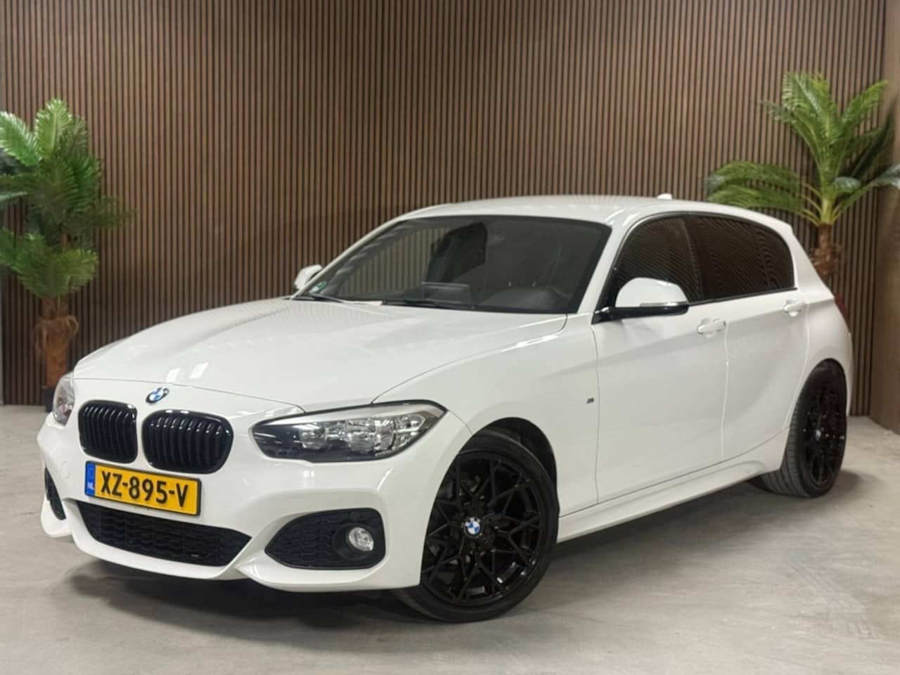BMW 1-serie - 116i M Sport Edition sport uitlaatsysteem - AutoWereld.nl