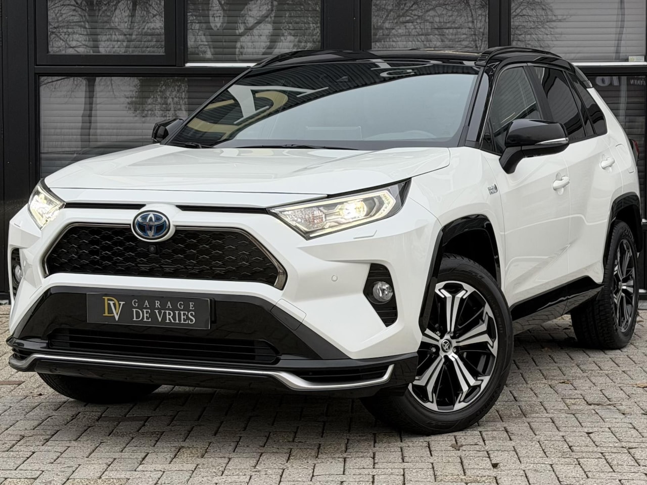 Toyota RAV4 - 2.5 Plug-in Hybrid AWD Bi-Tone Full Option ACC 360 Camera Garantie - AutoWereld.nl