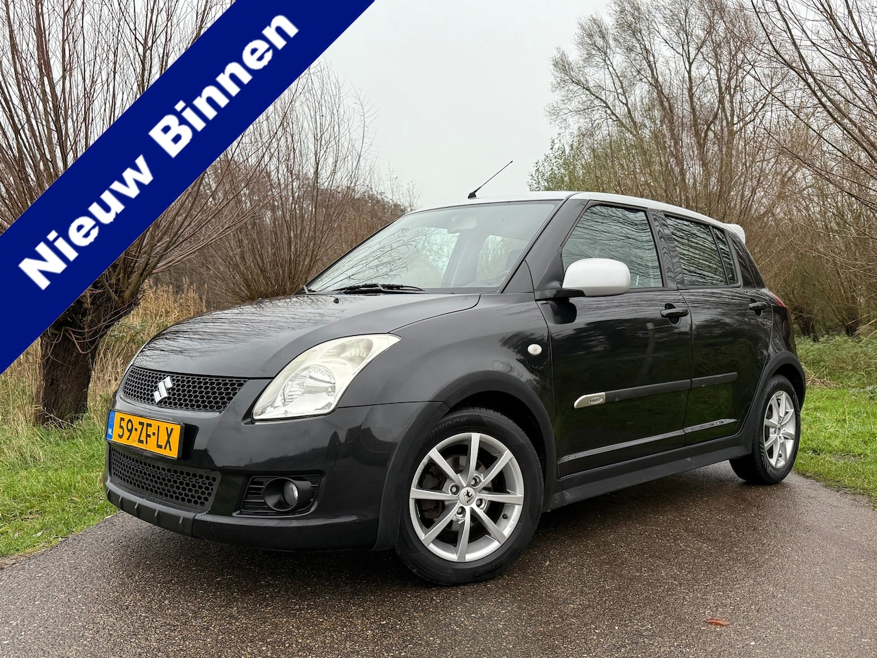 Suzuki Swift - 1.3 Cool 1e Eigenaar Airco 15 Velgen slechts 157.297 km Goed onderhouden! - AutoWereld.nl