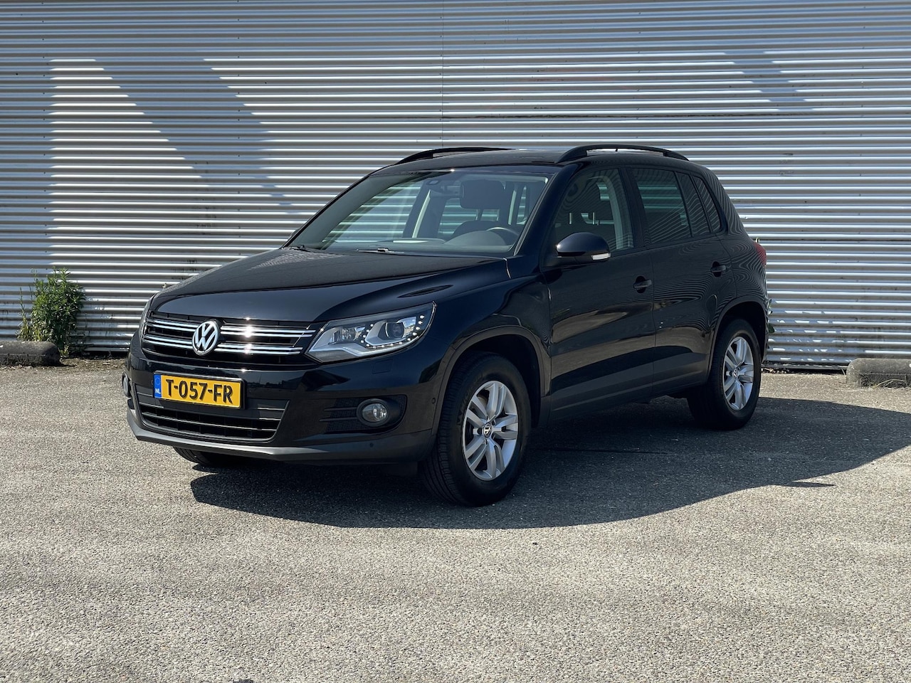 Volkswagen Tiguan - 1.4 TSI Comfort&Design|Stoelverwarming|Pano|Trekh. - AutoWereld.nl