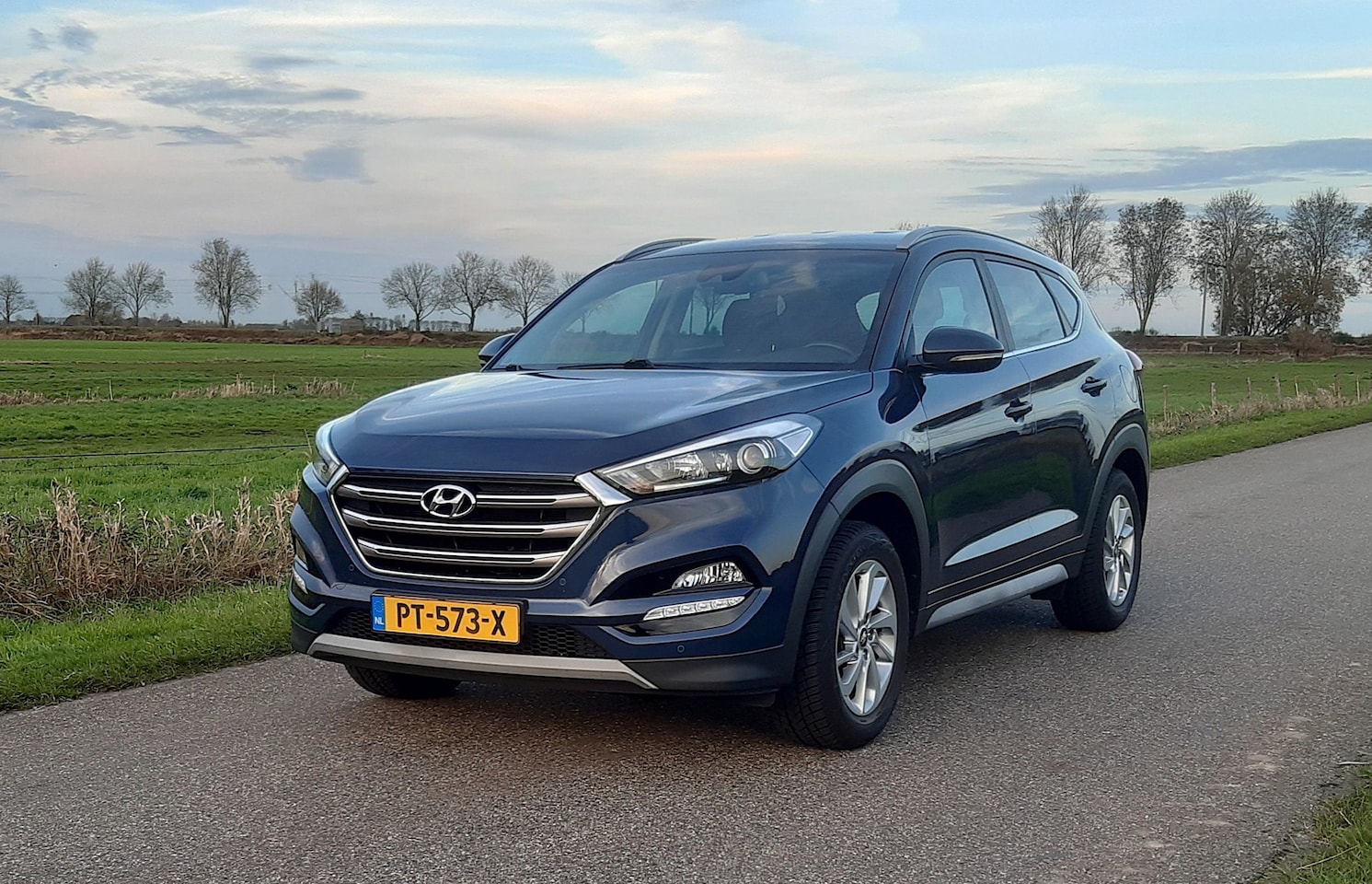 Hyundai Tucson - 1.6 GDI Comfort in zeer goede staat met zomer- en winterbandenset - AutoWereld.nl