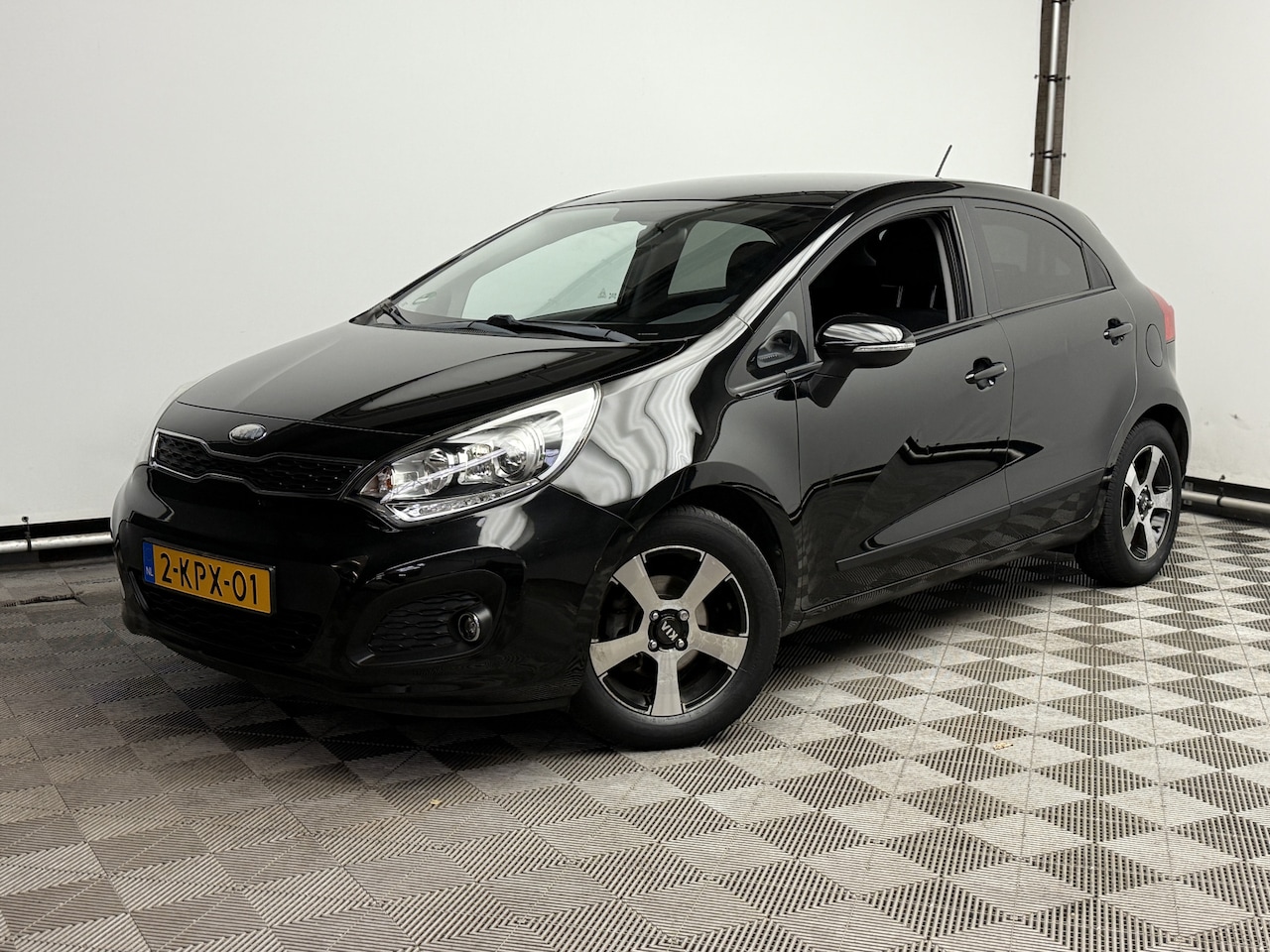 Kia Rio - 1.2 CVVT Plus Pack 5-drs Navi Lm16" 1e Eigenaar - AutoWereld.nl