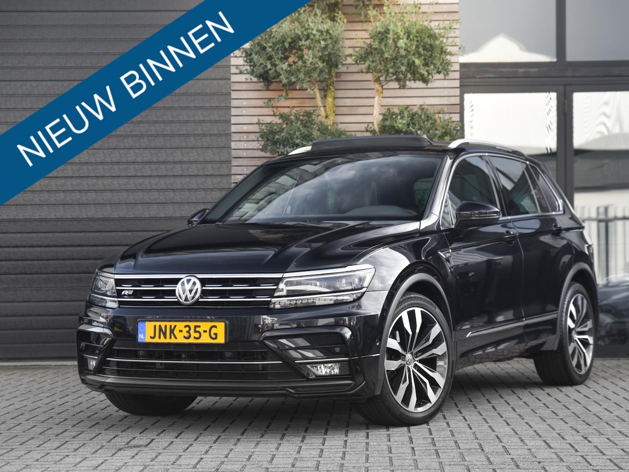 Volkswagen Tiguan - 1.4 TSI R-Line DSG Panoramadak Camara 20 inch - AutoWereld.nl