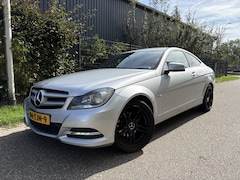 Mercedes-Benz C-klasse Coupé - 180 / AUTOMAAT / LEER / NAVI / CRUISE
