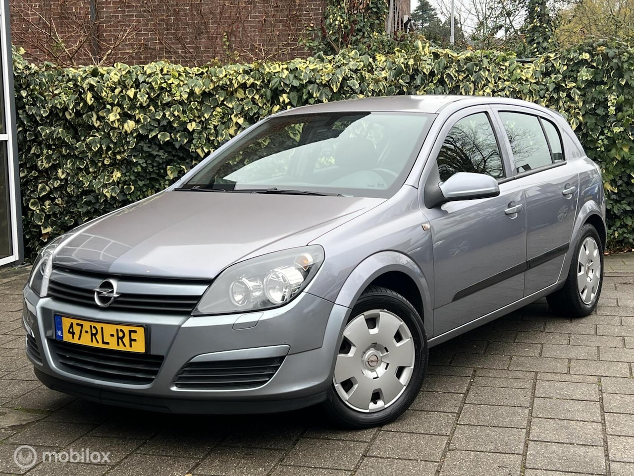 Opel Astra - 1.4 Enjoy 1.4 Enjoy - AutoWereld.nl