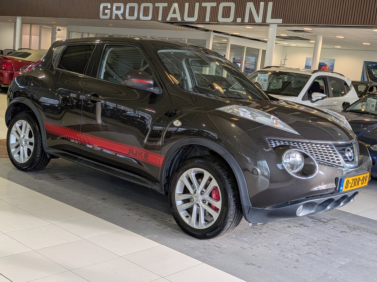 Nissan Juke - 1.6 DIG-T Tekna Airco, Cruise Control, Trekhaak, Stuurbekrachtiging - AutoWereld.nl