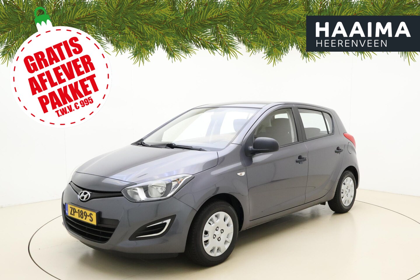 Hyundai i20 - 1.2 16v 85pk 5drs HP i-Motion | Airco | Centrale deurvergrendeling | Metallic lak | Radio/ - AutoWereld.nl