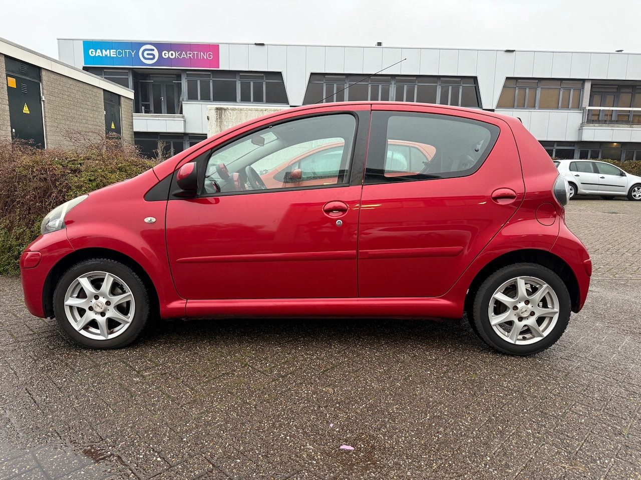 Toyota Aygo - 1.0-12V Aspiration Red - Automaat - AutoWereld.nl