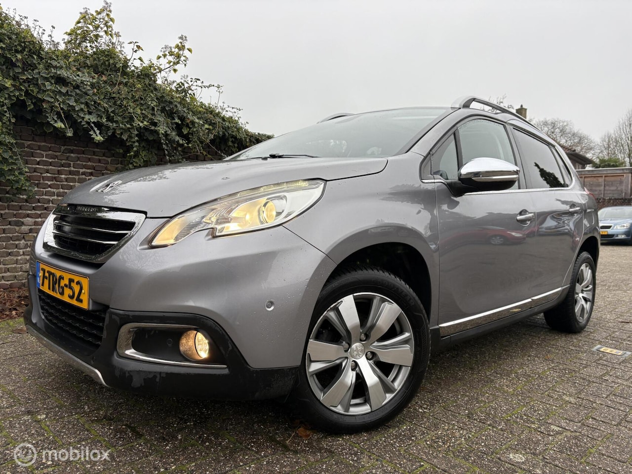 Peugeot 2008 - 1.2 VTi Allure Pack Premium Plus / AUTOMAAT - AutoWereld.nl