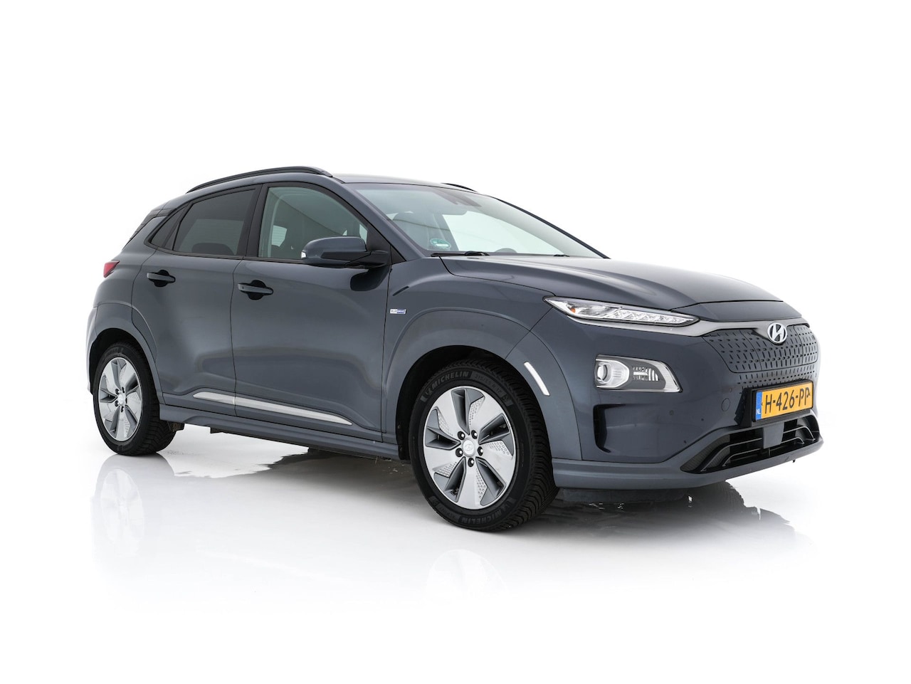Hyundai Kona Electric - EV Premium 64 kWh ( Fase-3 ) { SOH-96%) Aut.* HEAT-PUMP | NAVI-FULLMAP | KEYLESS | CAMERA - AutoWereld.nl