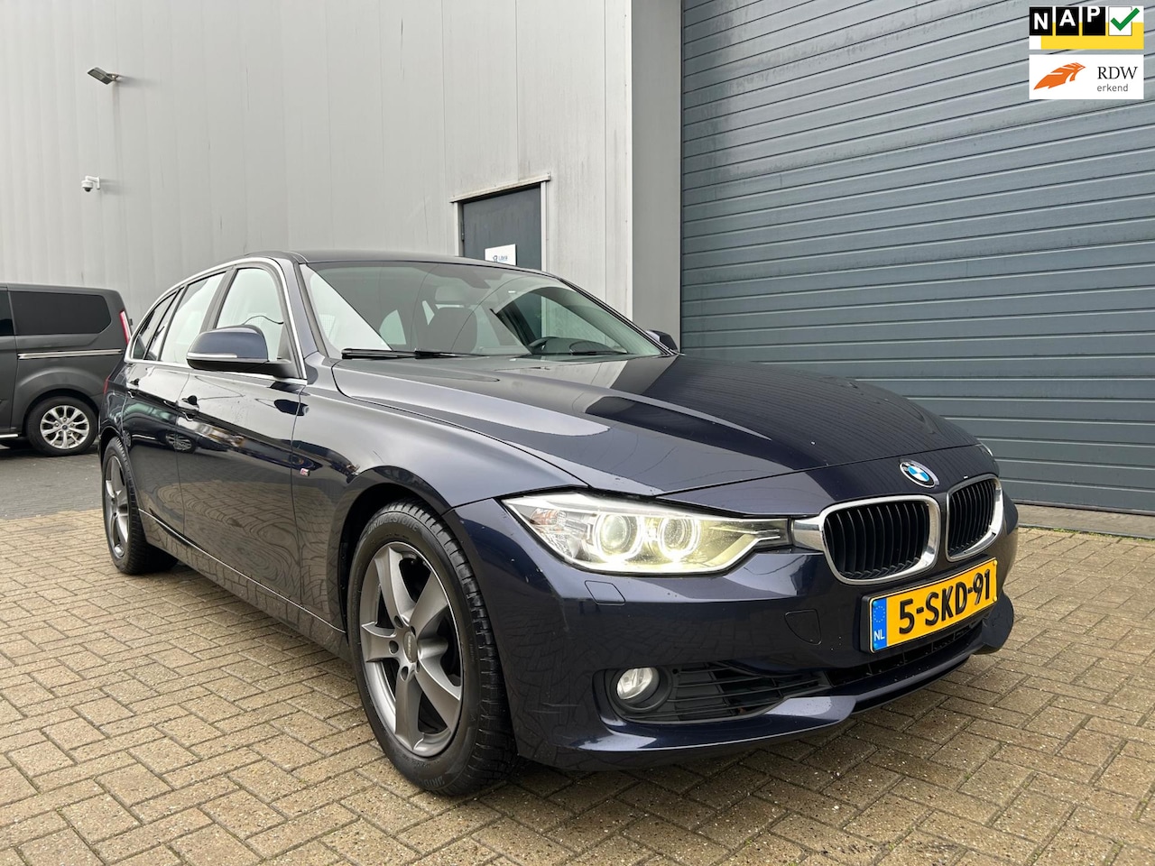 BMW 3-serie Touring - 320i Executive AUT NAVI XENON 2013 - AutoWereld.nl