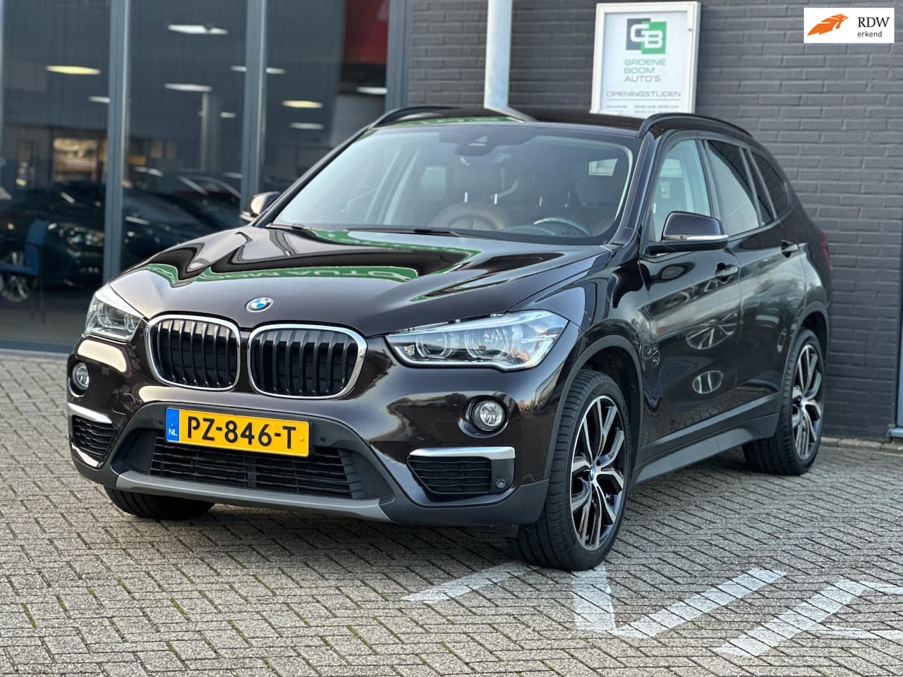 BMW X1 - SDrive18i Centennial High Executive/NAV/LEDER/TREKHAAK/AUTOMAAT/NETTE STAAT!! - AutoWereld.nl