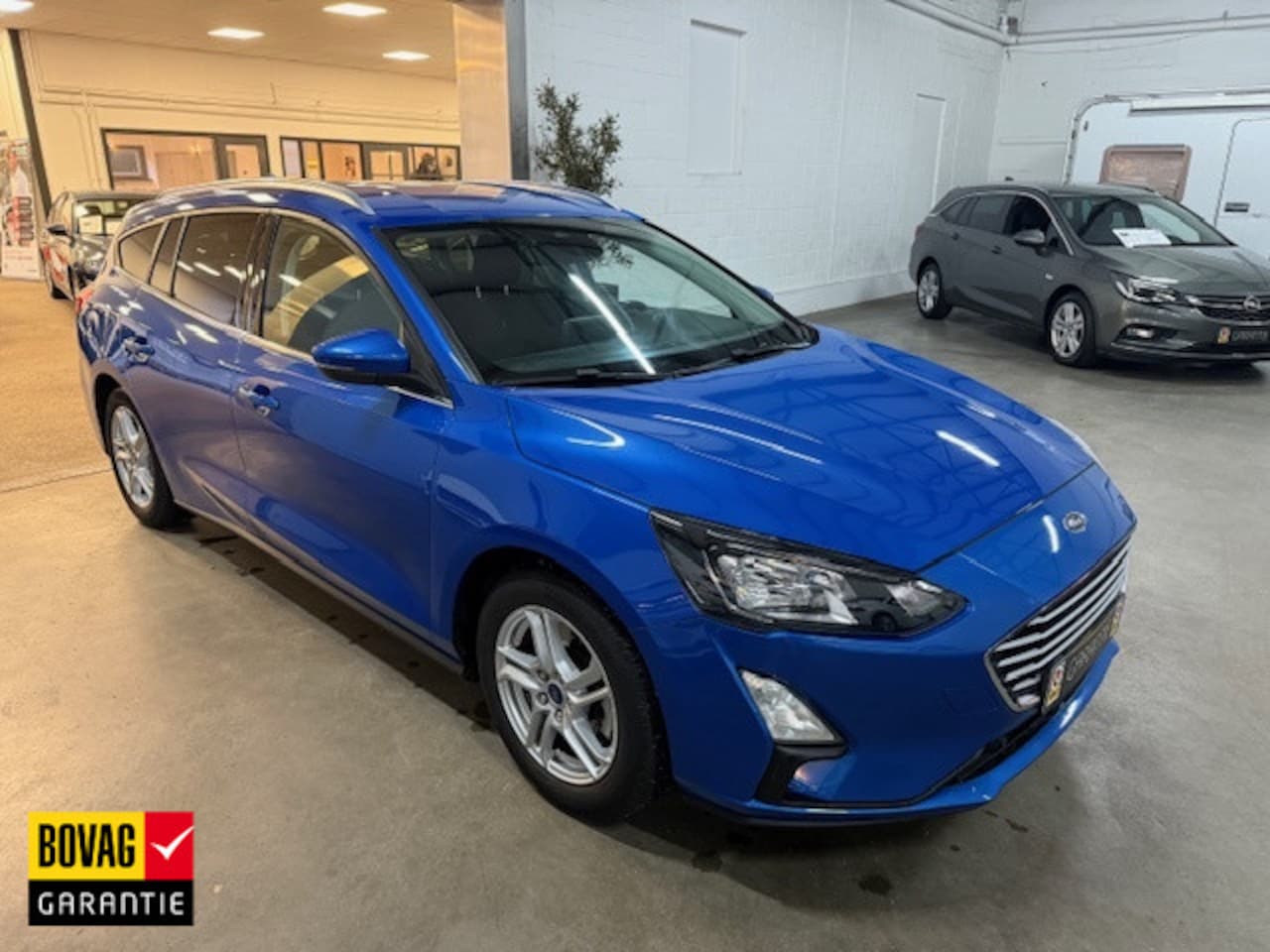 Ford Focus Wagon - 1.0 EBHybrid Tr Ed. bns - AutoWereld.nl